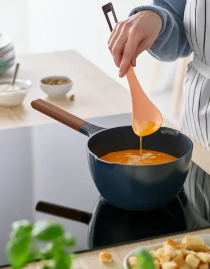 قاشق مخصوص آشپزی نارنجی روشن/قرمز تیره سایز۳۳ ایکیا مدل KNORRHANE