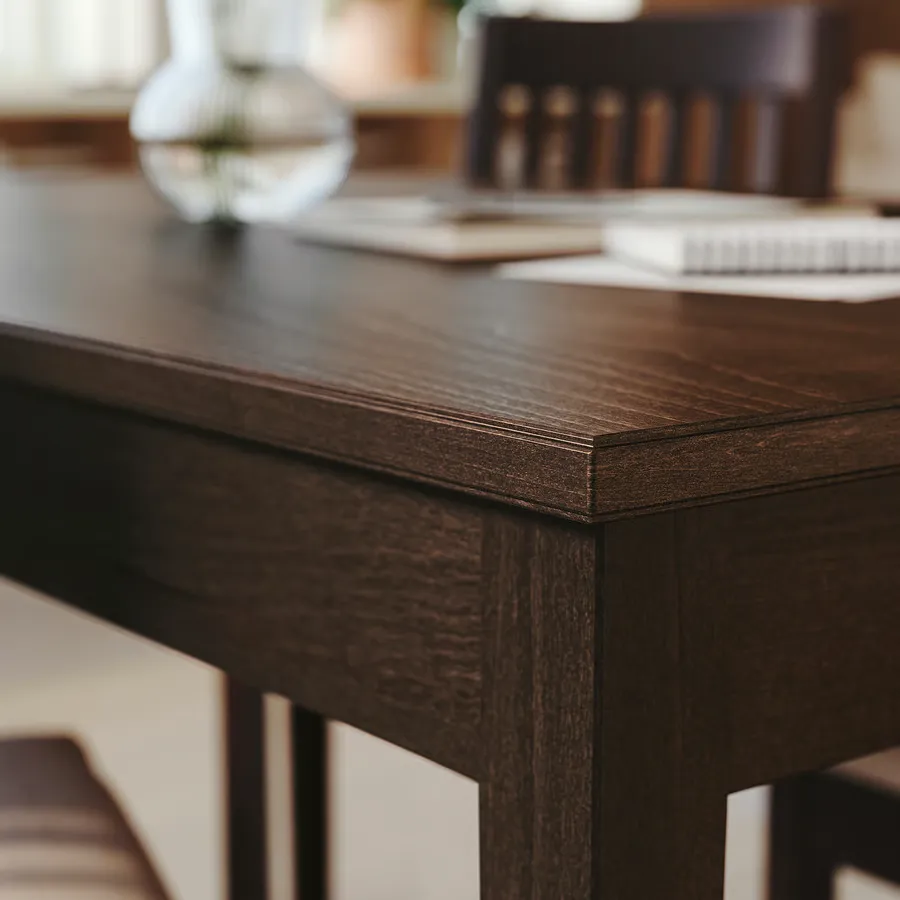 میز روکش راش با رنگ قهوهای تیره سایز ۱۳۰x۸۰ ایکیا مدل NÄSINGE