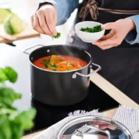 قابلمه با درب، روکش نچسب، استیل ضد زنگ/مشکی-خاکستری، ۳ لیتر ایکیا مدل GULDÖRING